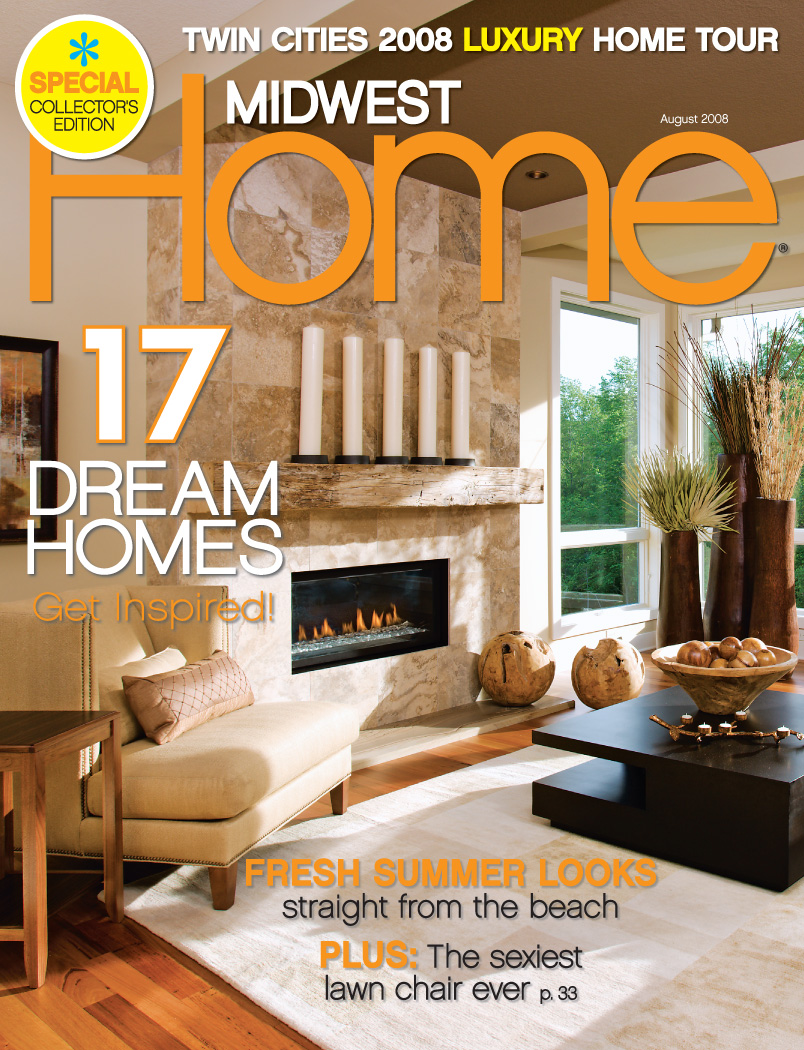 Midwest Home August 2008 Cover witha warm transitional living room with a modern fireplace framed with a light tan tile and light tan loveseat. The coffee table is dark brown and the area rug is light tan on top of red oak floors.