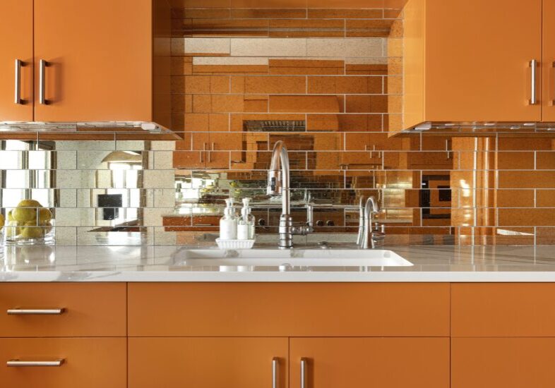 orange kitchen mirrored tile backsplash 70's theme Cambria countertop wayzata minnesota